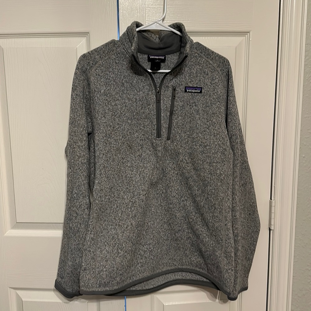 Men’s Patagonia grey quarter zip.  Perfect for layering fits true to size.
